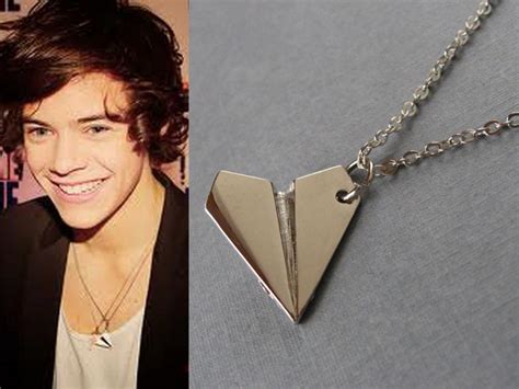 harry styles airplane necklace.